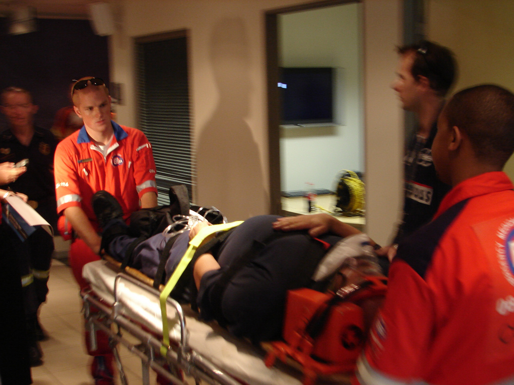 Patient on a stretcher with paramedics